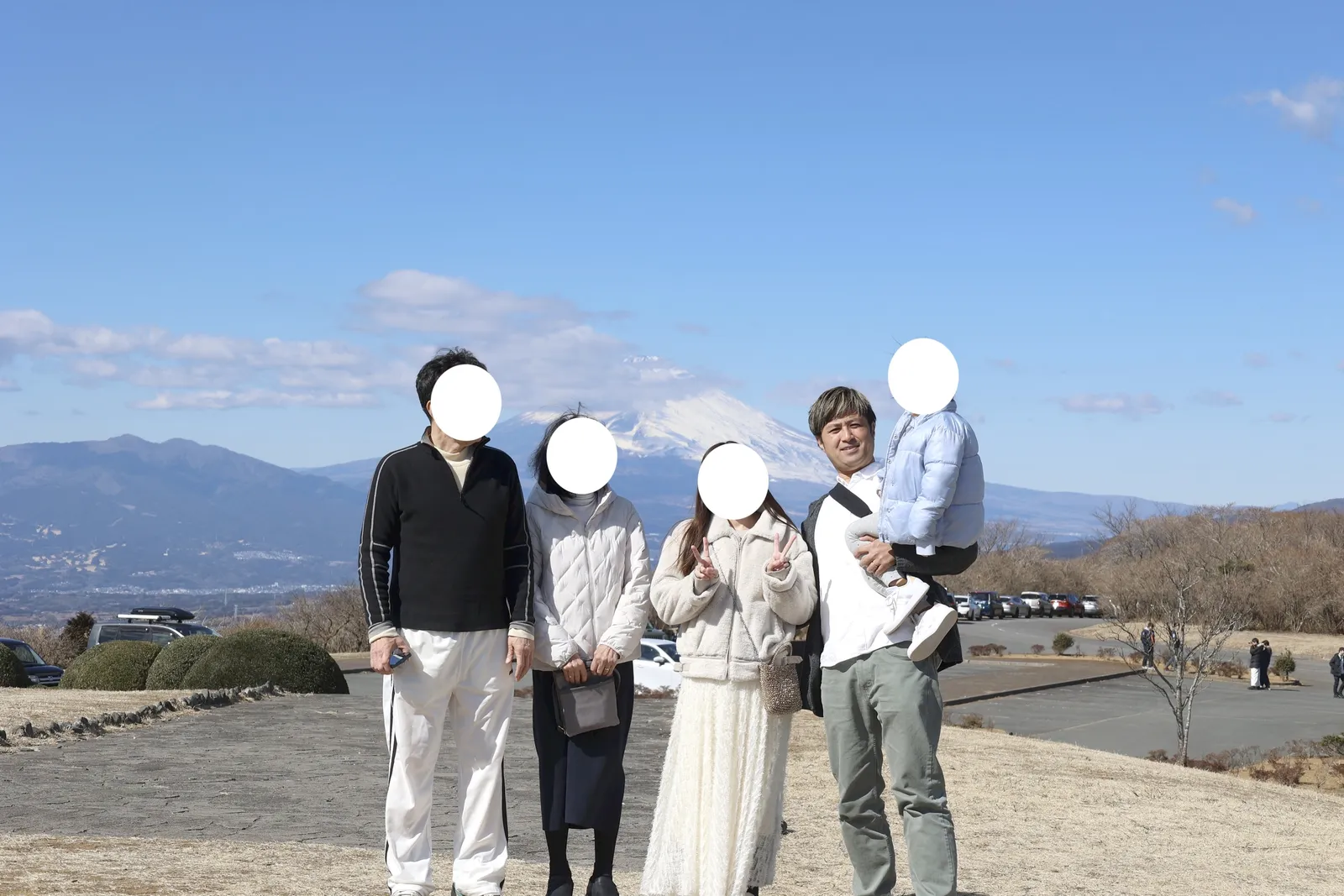 A family photo at Takichiyama Enchi, with Mt. Fuji in the background