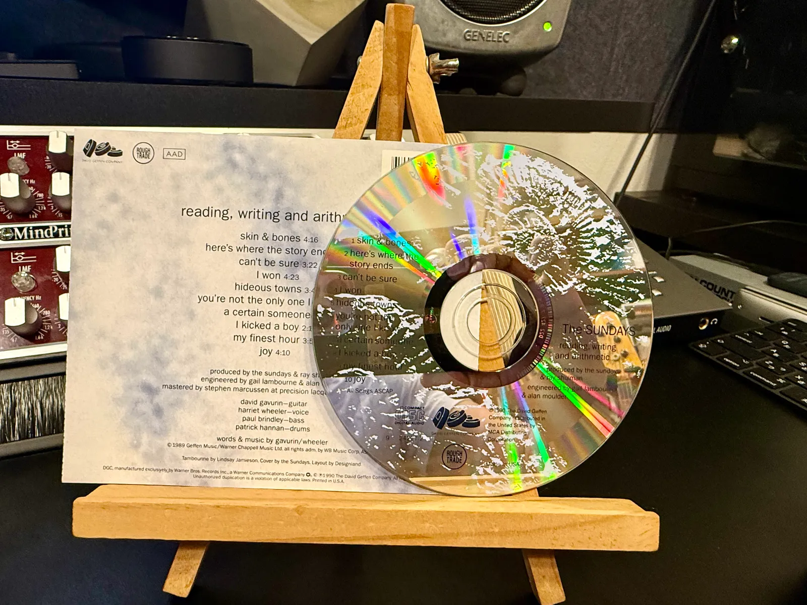 The disc, and the track list on the lyric card — third from the top sits "Can't Be Sure"